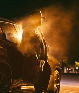 man-sitting-car-night_23-2149001285